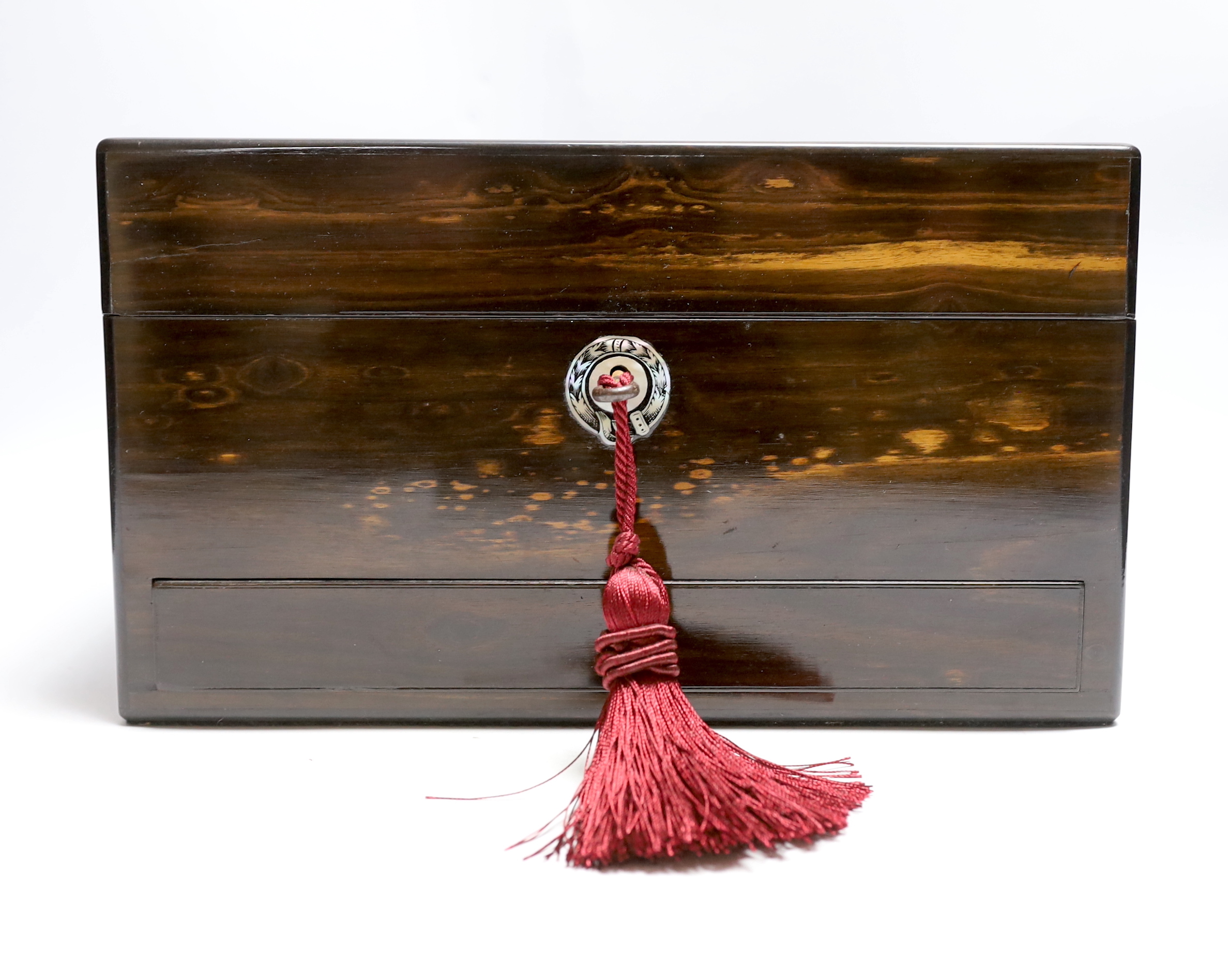 A Victorian coromandel wood toilet box with plated fittings and Mother of Pearl inlay to lid, fitted internal compartments containing glass bottles with plated lids and other accessories, and jewellery drawer underneath